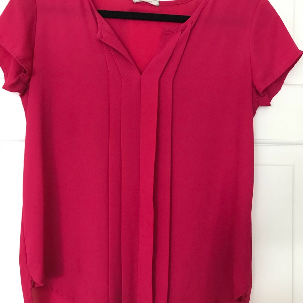 Pleated chiffon shirt.